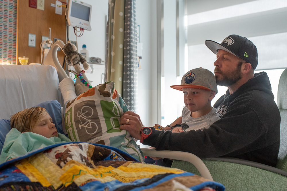 Mav visiting his brother, Kane, after heart surgery.
